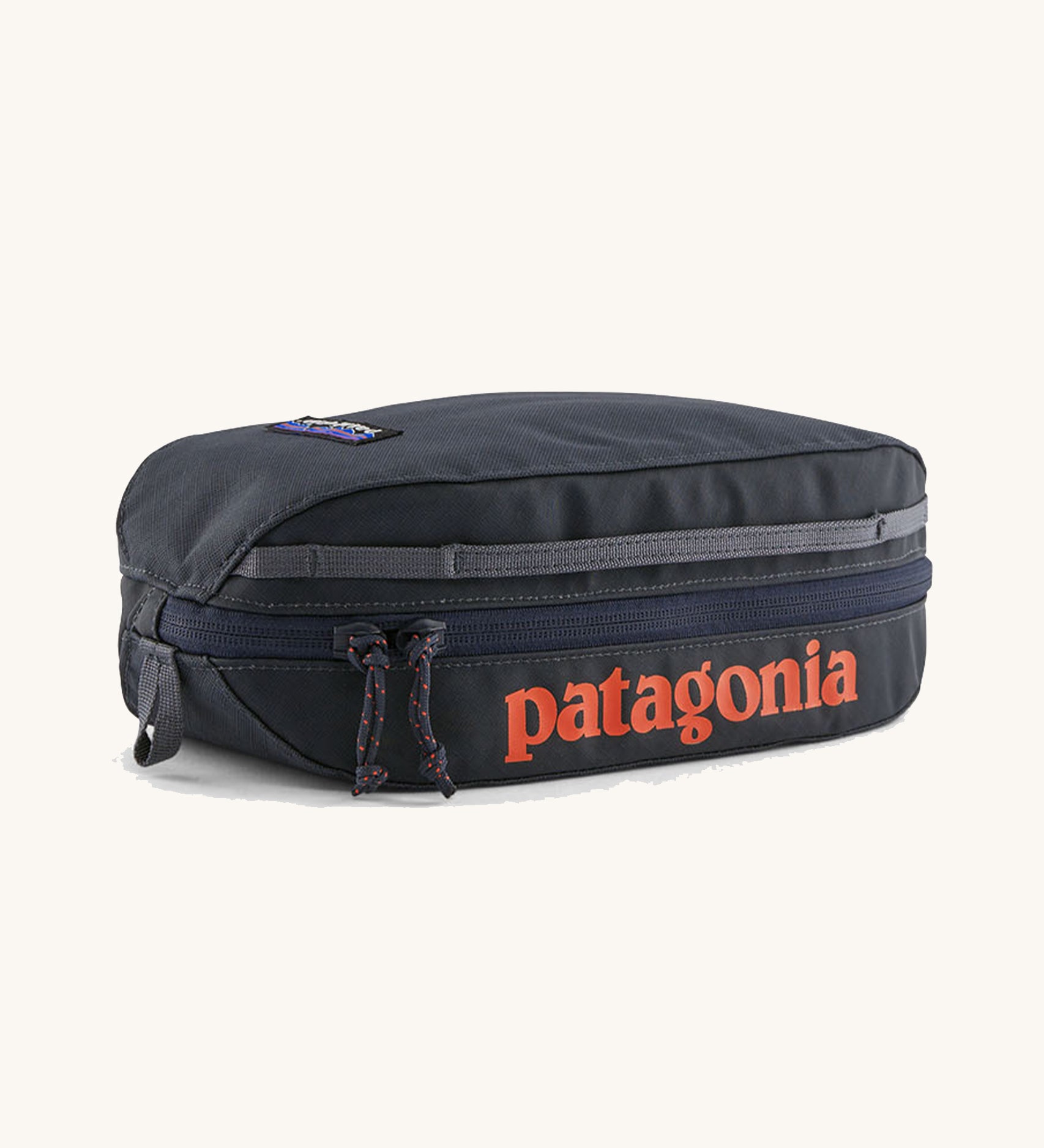 Patagonia Black Hole Small 3L Travel Cube Wash Bag - Smolder Blue on a cream background