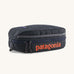 Patagonia Black Hole Small 3L Travel Cube Wash Bag - Smolder Blue on a cream background