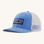 Patagonia low trucker hat in a light blue colour on a cream background.