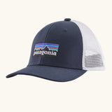 Patagonia Kids P6 logo baseball cap in navy with a white mesh back panel. Showing brand patch on the front