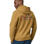 A man wearing a Patagonia Unity Fitz Uprisal Hoody in a yellow colour stood in front of a plain background. The man is facing away from the camera, showing the back of the top. 