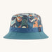 Patagonia wavefarer bucket hat in  blue and multicoloured geo design on a cream background.