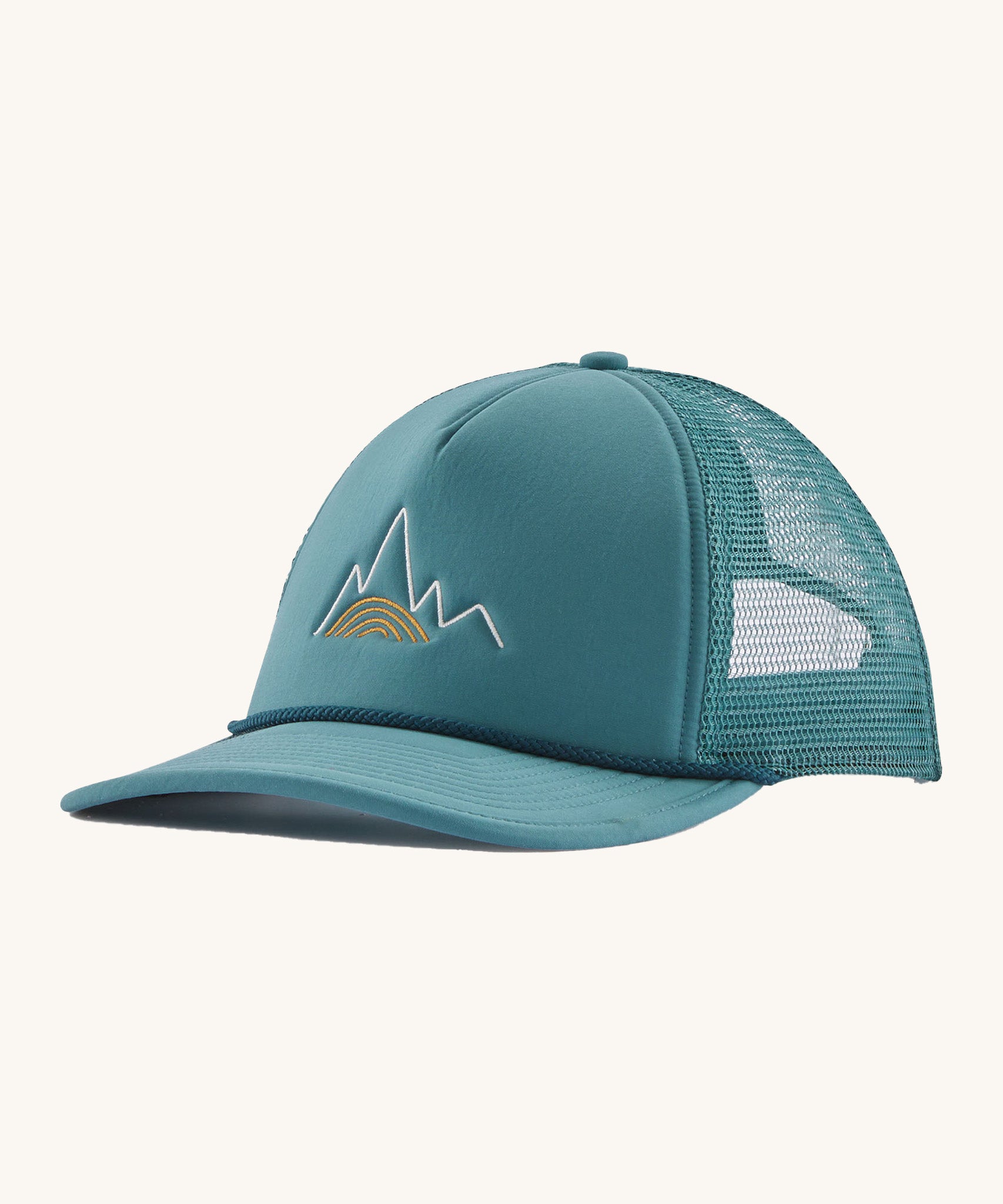 Patagonia broadcaster cap in turquoise colour on a cream background.
