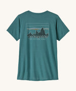 patagonia women's capilene top in a turquoise colour with logo design on a cream background.
