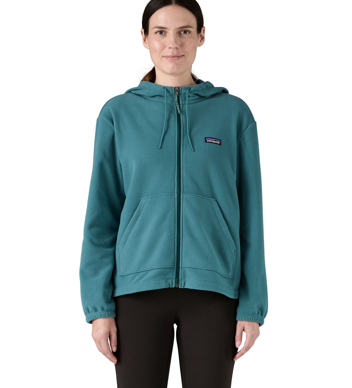 Patagonia women's micro fleece hooded jacket in a turquoise colour worn by a woman front detail