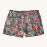 Patagonia women's barely baggies shorts in turquoise and fish design on a cream background.