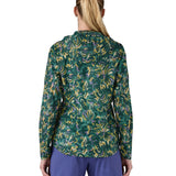 Patagonia women's houdini jacket in a turquoise colour with a retro flower design worn by a woman back detail