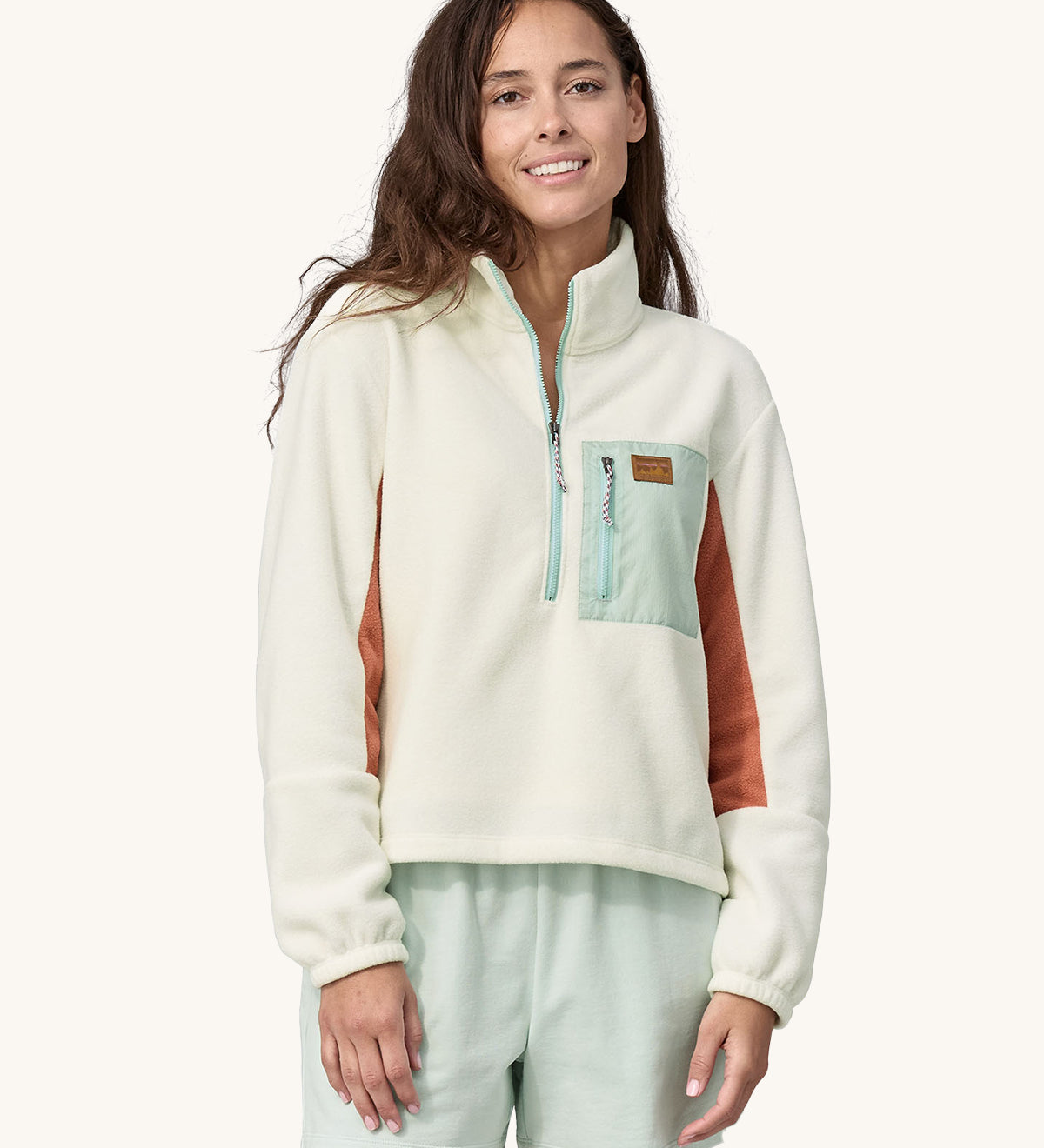  a brown Patagonia logo on the pocket
