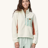  a brown Patagonia logo on the pocket