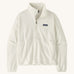 Patagonia women's micro 1/2 zip fleece in white on a cream background.
