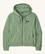 Patagonia women's Anhya hoody. A pastel green lightweight jacket available at Babipur. Features a full length zip, a logo patch stitched on the left chest, a easy access pockets and a drawstring around the hood for size adjustments.  
