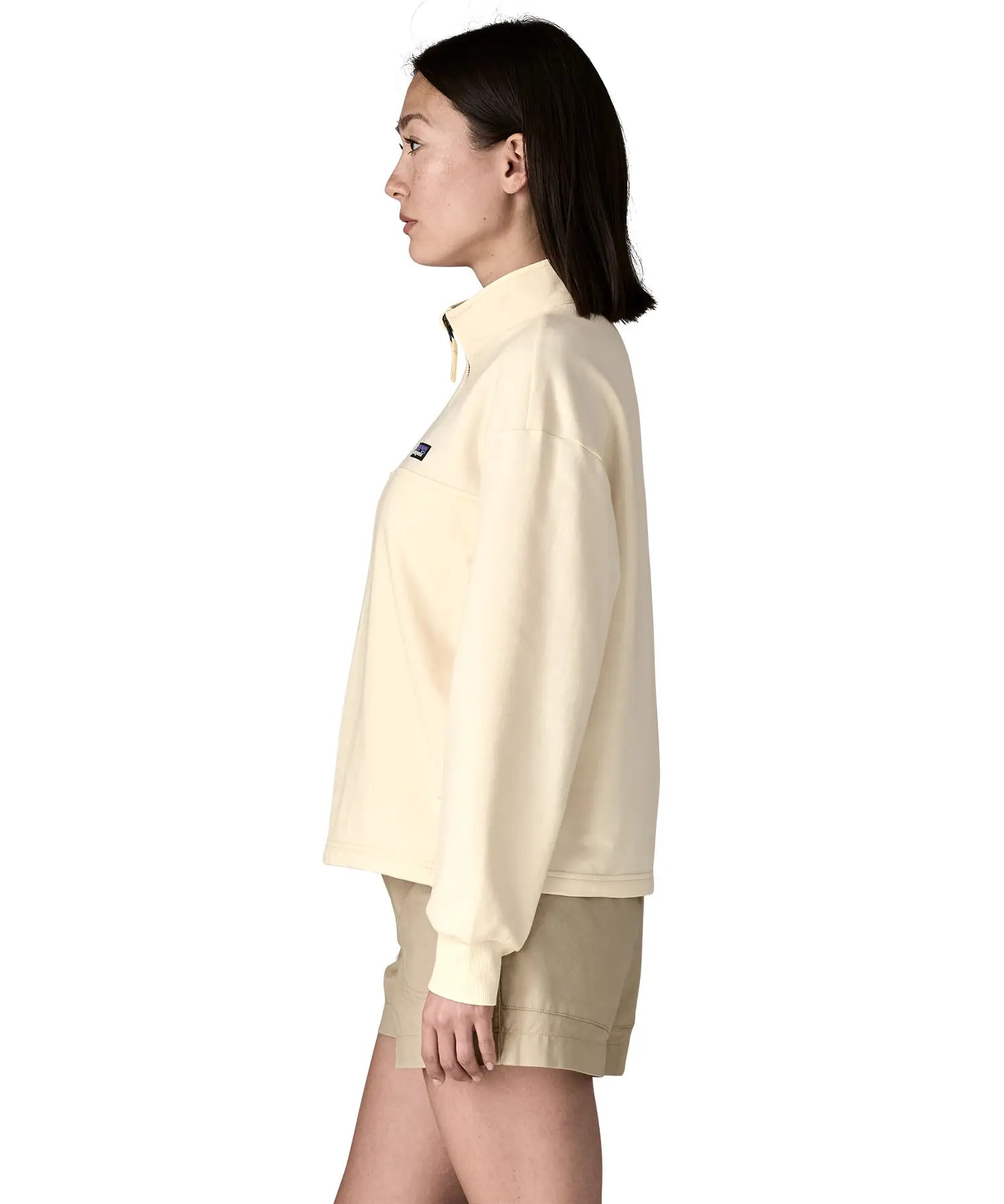 Side of woman wearing Patagonia's Women's Ahnya Pullover. Pullover has a relaxed fit and sits at the hips