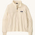 Patagonia women's Anya pullover. A cream lightweight pullover, features a 1/4 length zip, easy access side pockets and the logo patch stitched on the left chest.