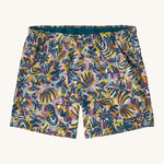 patagonia womens baggies shorts in a wild botanist and tidal teal design on a cream background.