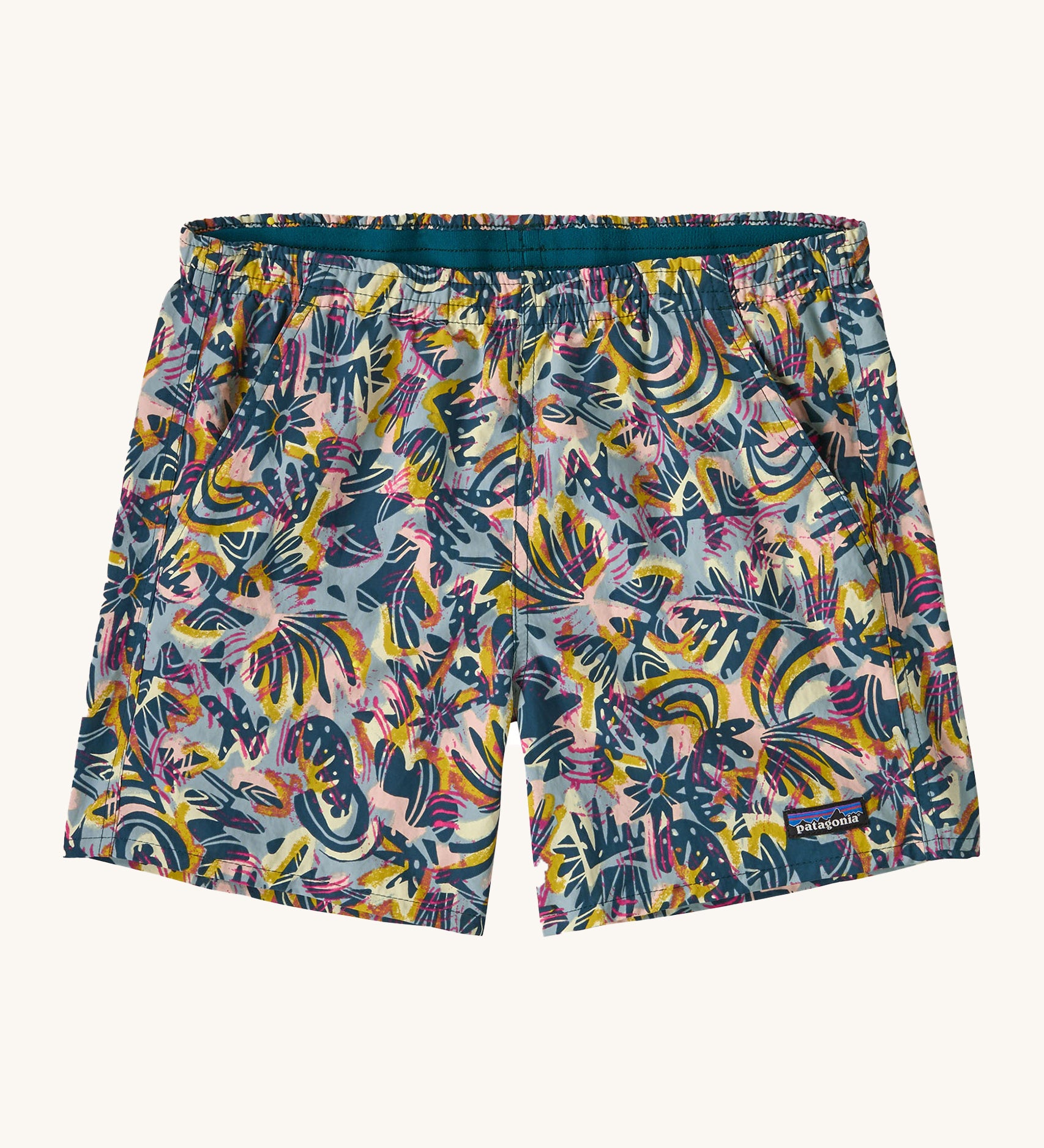 patagonia womens baggies shorts in a wild botanist and tidal teal design on a cream background.
