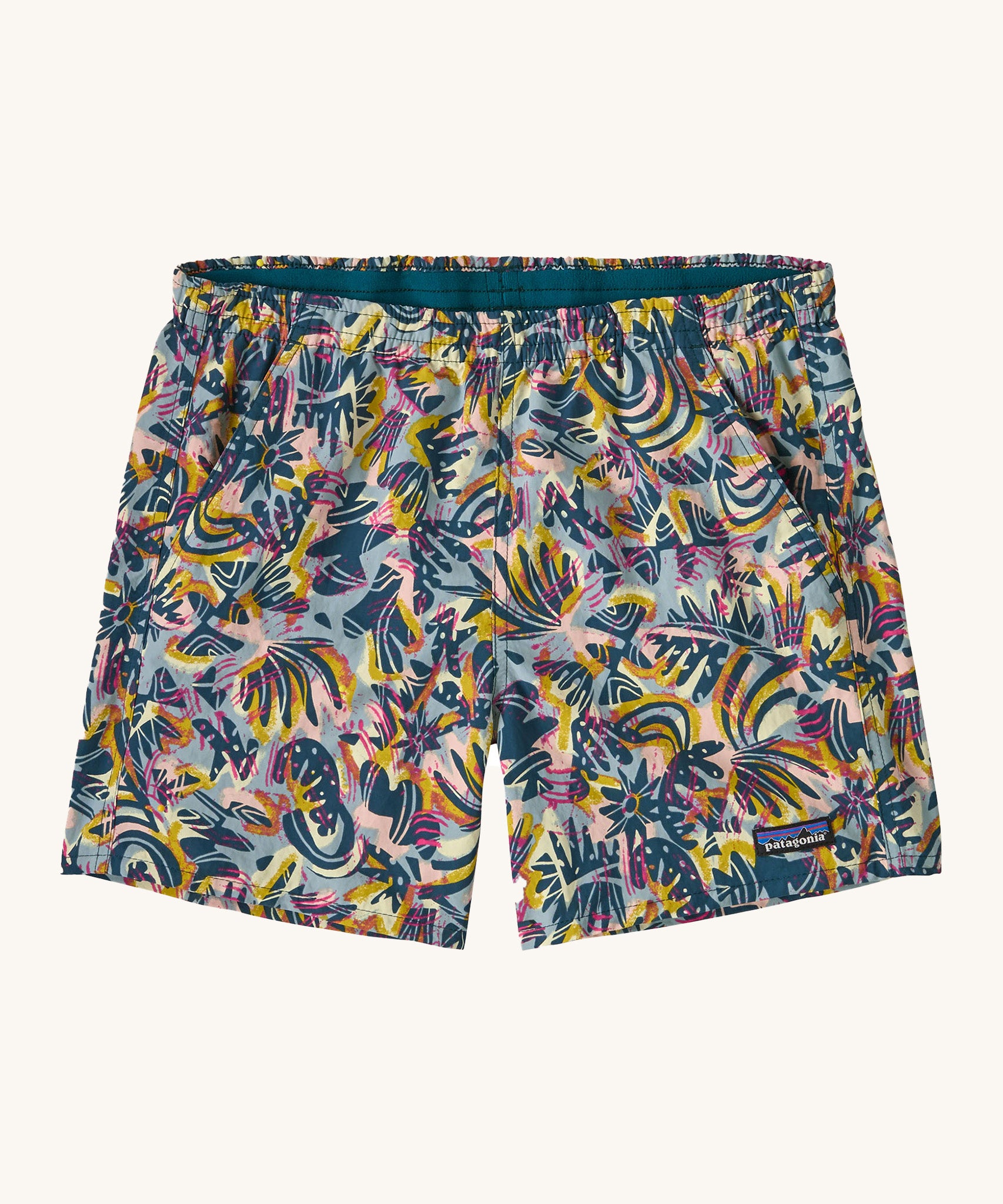 patagonia womens baggies shorts in a wild botanist and tidal teal design on a cream background.