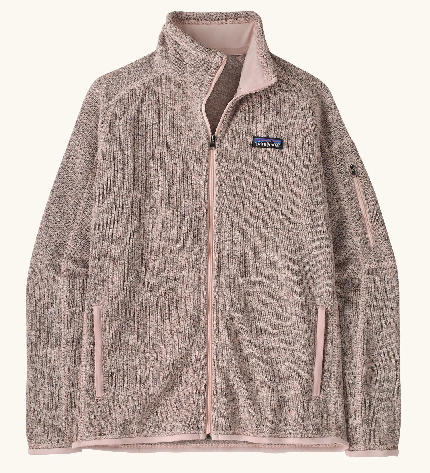 Patagonia women’s better sweater fleece jacket in pink frost. Full zip jacket with zipped arm pocket and handwarmer pockets.