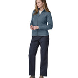 A woman wearing a Patagonia Women's Better Sweater Jacket Utility Blue stood in front of a plain background