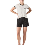 Patagonia women's baggies shorts in black worn by a woman front detail 