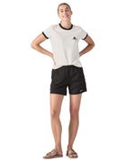Patagonia women's baggies shorts in black worn by a woman front detail 