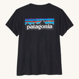 Patagonia women's short sleeve top in black showing the large logo printed on back