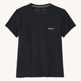 Patagonia women's short sleeve top in black showing the logo text printed on the left chest