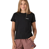Patagonia women's black short sleeve t-shirt with logo worn by a woman
