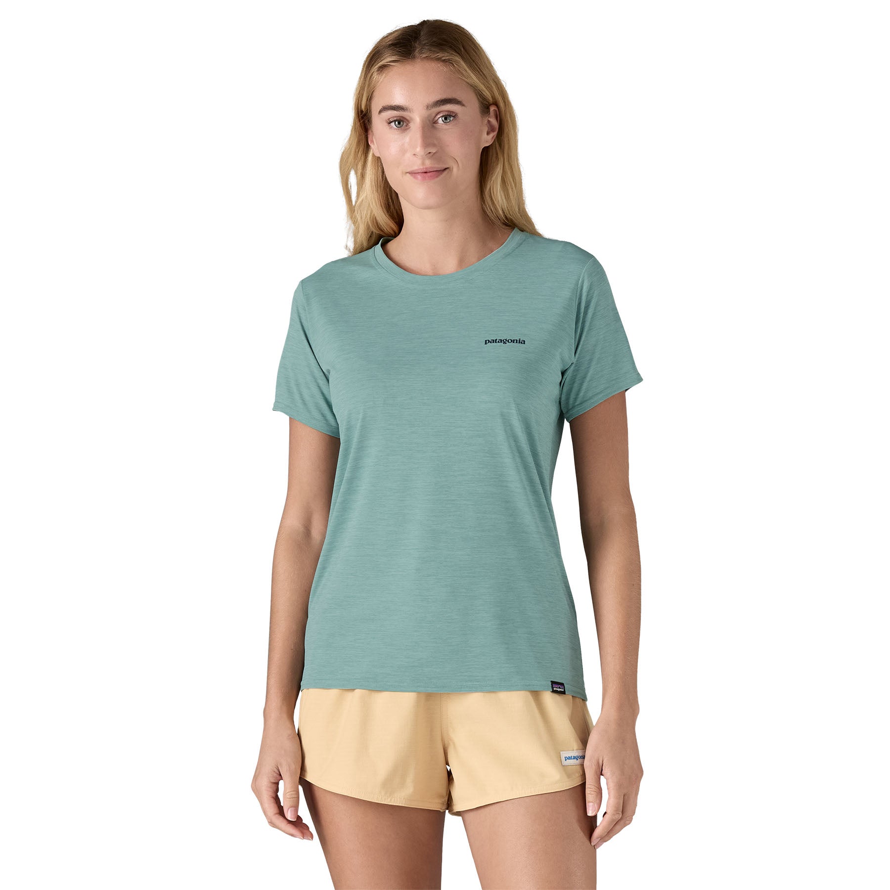 A woman wearing the Patagonia Women's Cap Cool Daily Graphic Shirt in a Waters Thermal Blue colour available at Babipur 