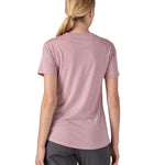 patagonia women's capilene short sleeve top worn by a woman back detail