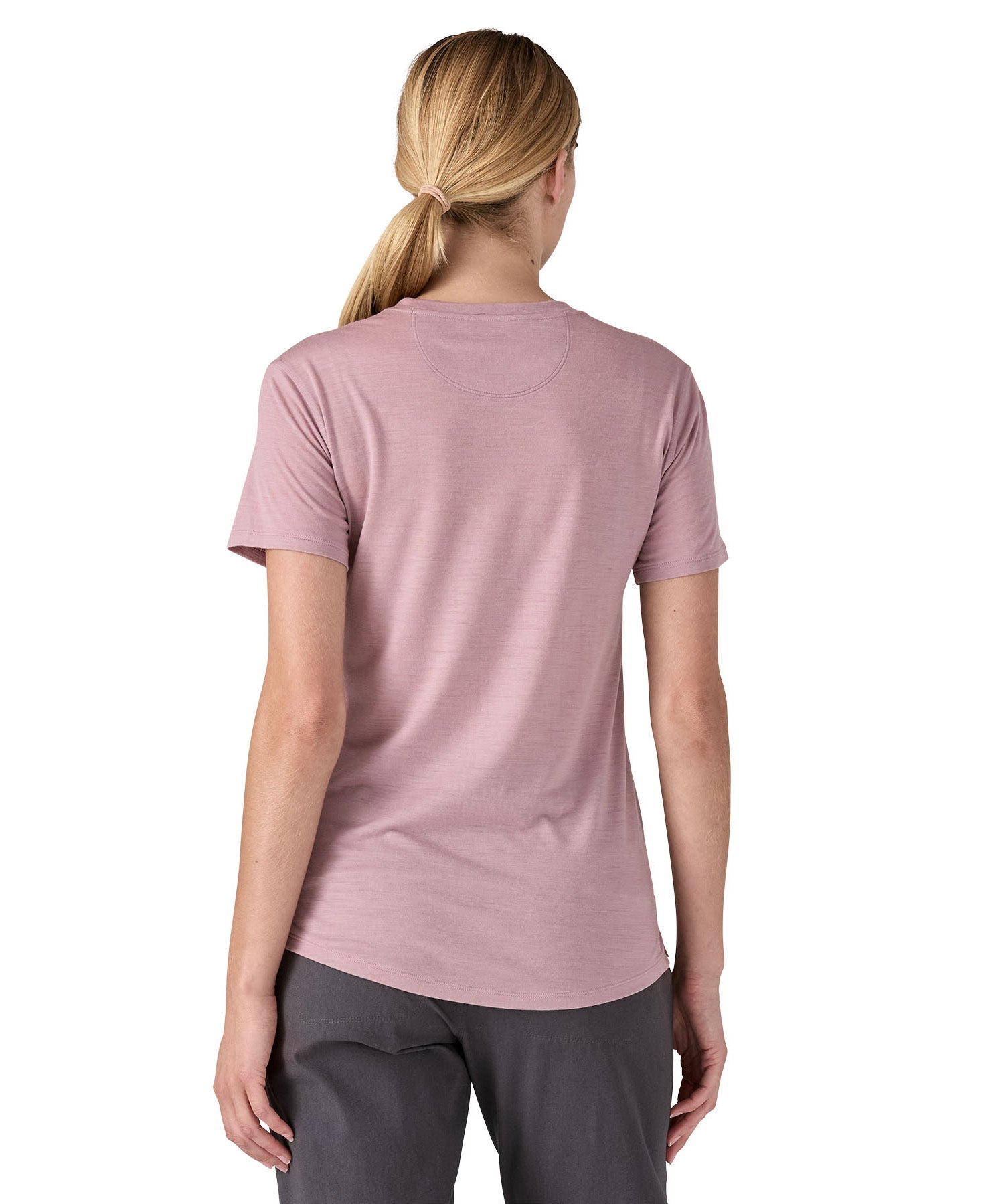 patagonia women's capilene short sleeve top worn by a woman back detail