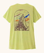 Back of the Patagonia women's capilene cool daily shirt with large cloud crag illustration in light vellum green.
