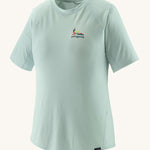 Patagonia Women's Capilene Cool Trail Graphic Shirt with a Lose It Wispy Green graphic on the left chest area.