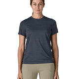 Front of woman wearing Patagonia women's capilene cool ultra short sleeve t-shirt in navy