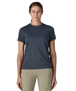Front of woman wearing Patagonia women's capilene cool ultra short sleeve t-shirt in navy