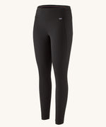 Patagonia Women's Capilene® Midweight Bottoms in black with diamond grid pattern for warmth and breathability.