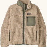 Patagonia Women's Classic Retro-X® fleece jacket in dark natural with green detailing.  Turn up collar, full length zip, 2 side handwarmer pockets and a green easy access chest pocket. 
