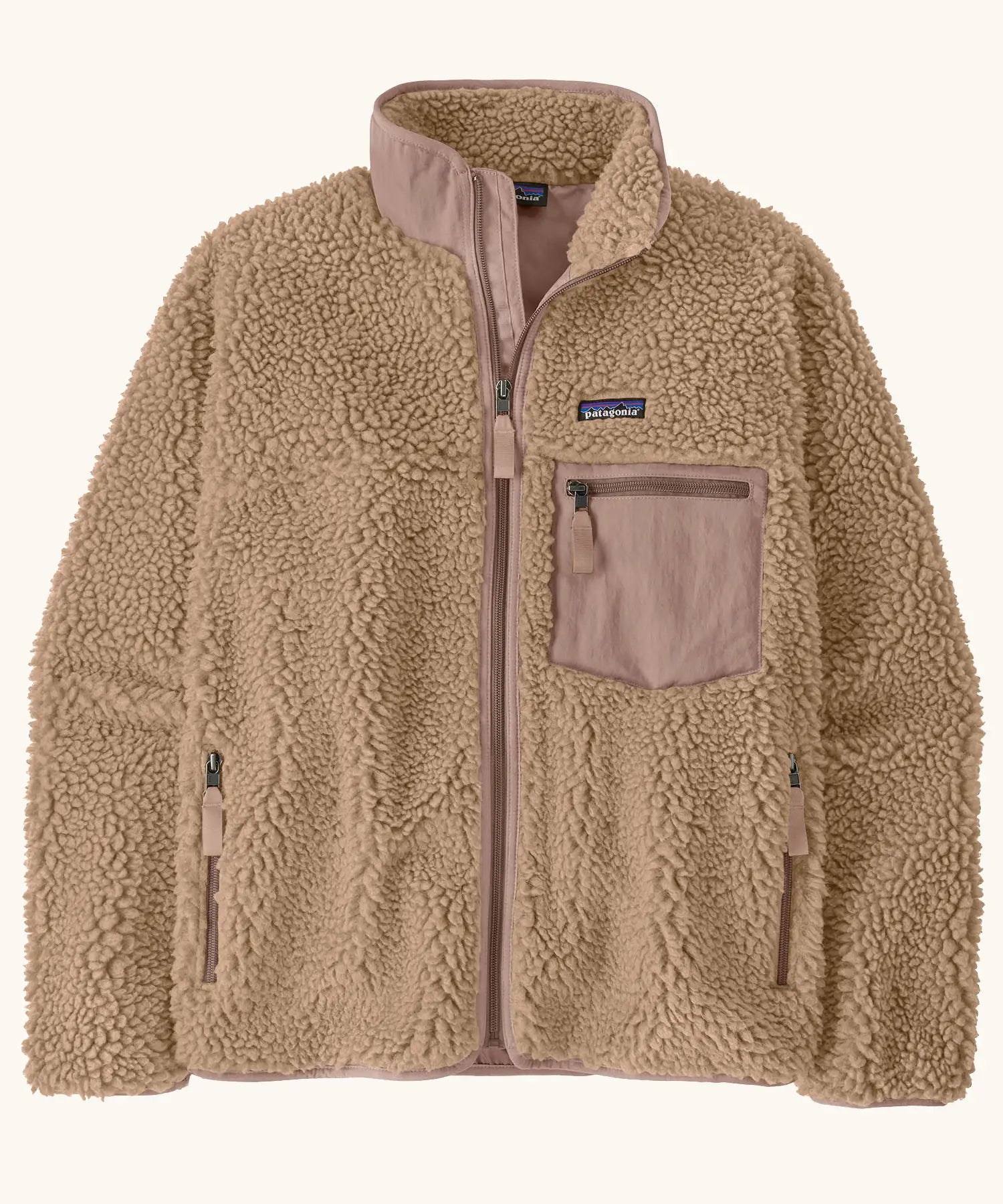 Patagonia Women's Classic Retro-X® Fleece Jacket with in oar tan. Turn up collar, full length zip, 2 side handwarmer pockets and an easy access pale pink chest pocket. 