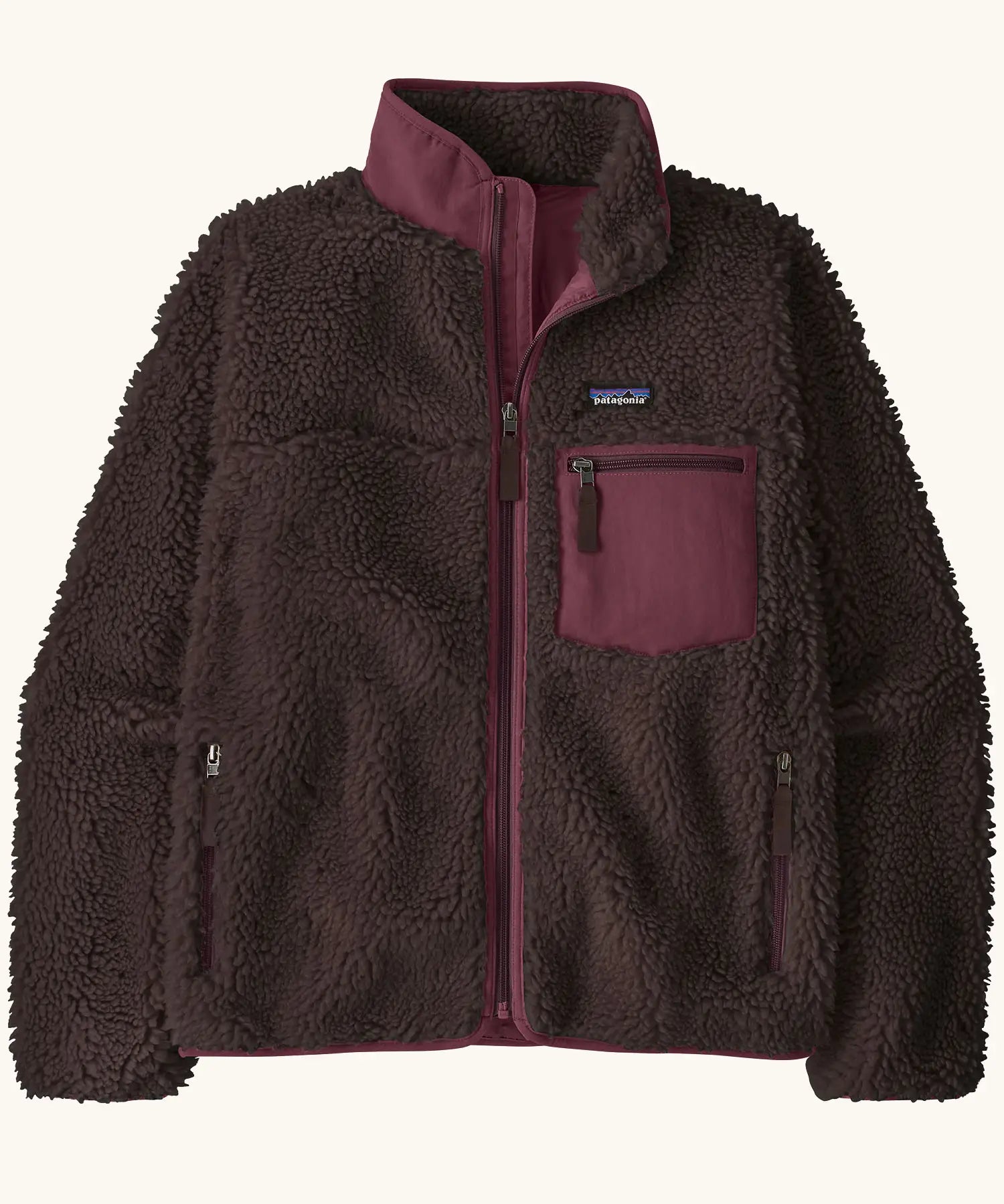 Patagonia Women's Classic Retro-X® fleece jacket in old brown with maroon detailing.  Turn up collar, full length zip, 2 side handwarmer pockets and a maroon easy access chest pocket. 