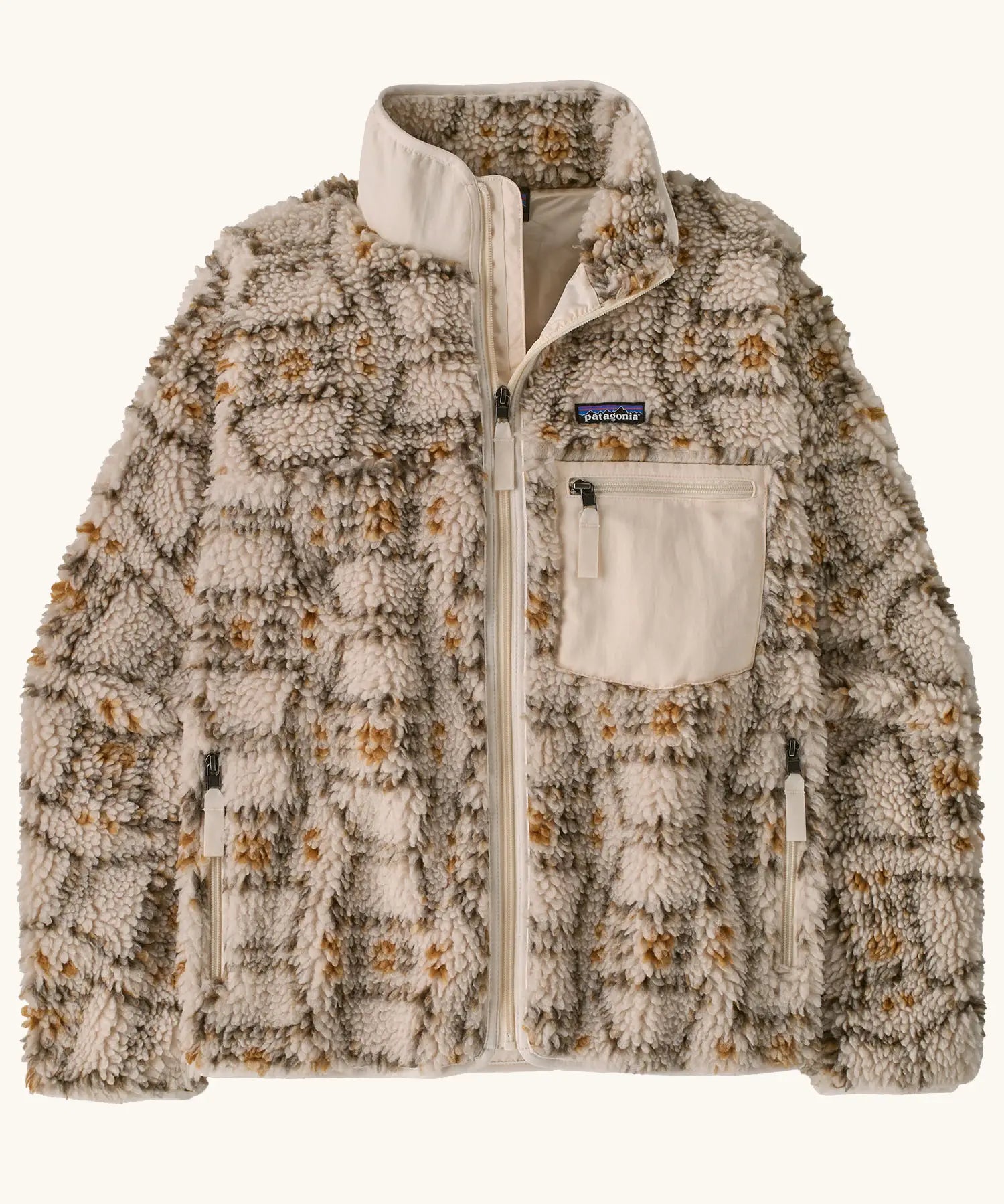 Patagonia Women's Classic Retro-X® Fleece Jacket with a snowshoe hare pattern on natural. Turn up collar, full length zip, 2 side handwarmer pockets and an easy access chest pocket. 