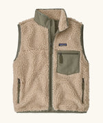 Patagonia women's classic retro-x fleece vest gilet in dark natural with river rock green detailing and zipped chest pocket. 