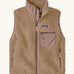Patagonia women's classic retro-x® fleece vest gilet in oar tan with pale pink chest pocket, collar and zip details.  Full zip up front with zipped handawarmer pocket and zipped pale pink chest pocket.