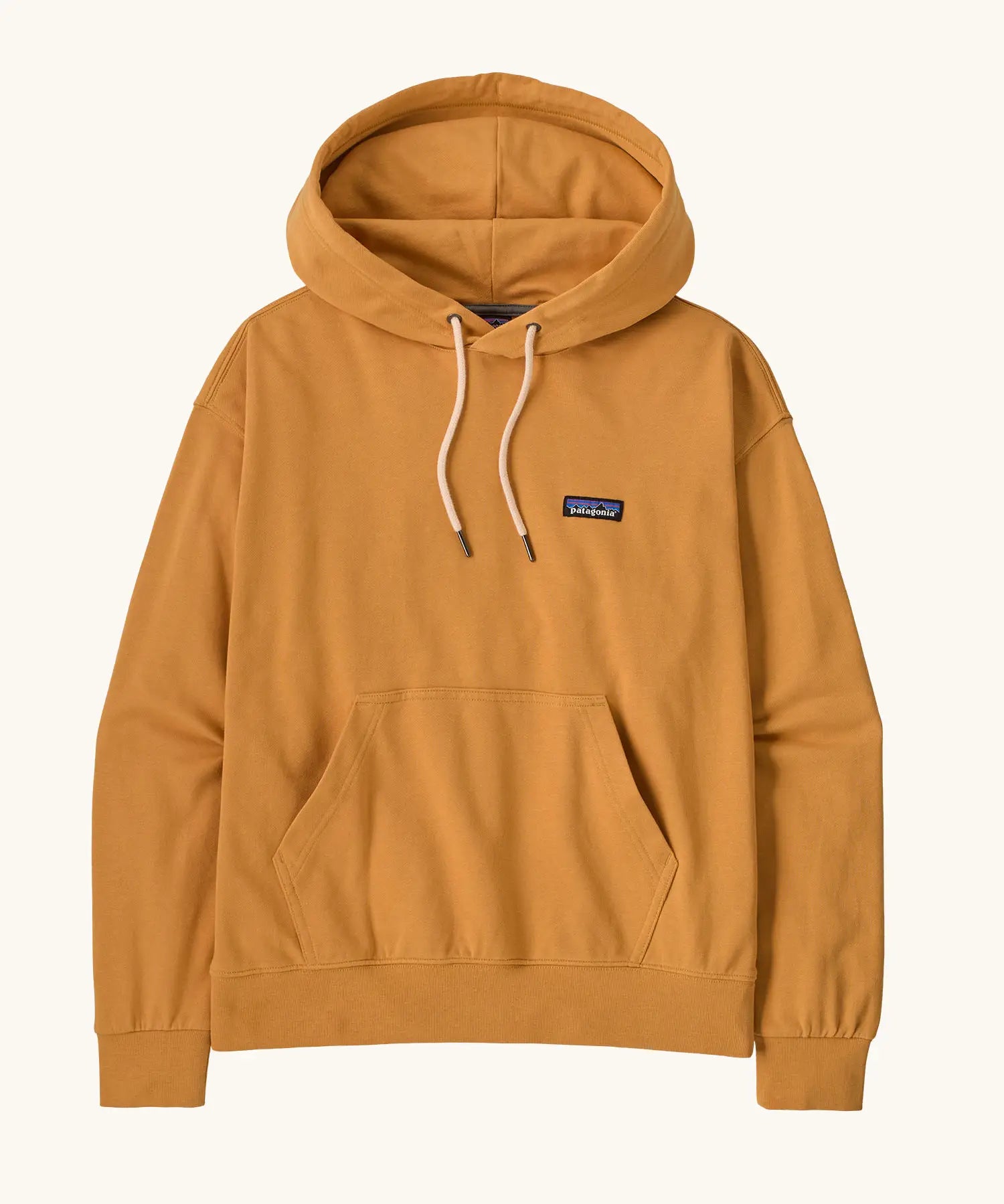 Patagonia women's cotton daily hoody in dried mango yellow with set-in sleeves, double lined hood, marsupial pocket and Patagonia® P-6 logo at the left chest. 
