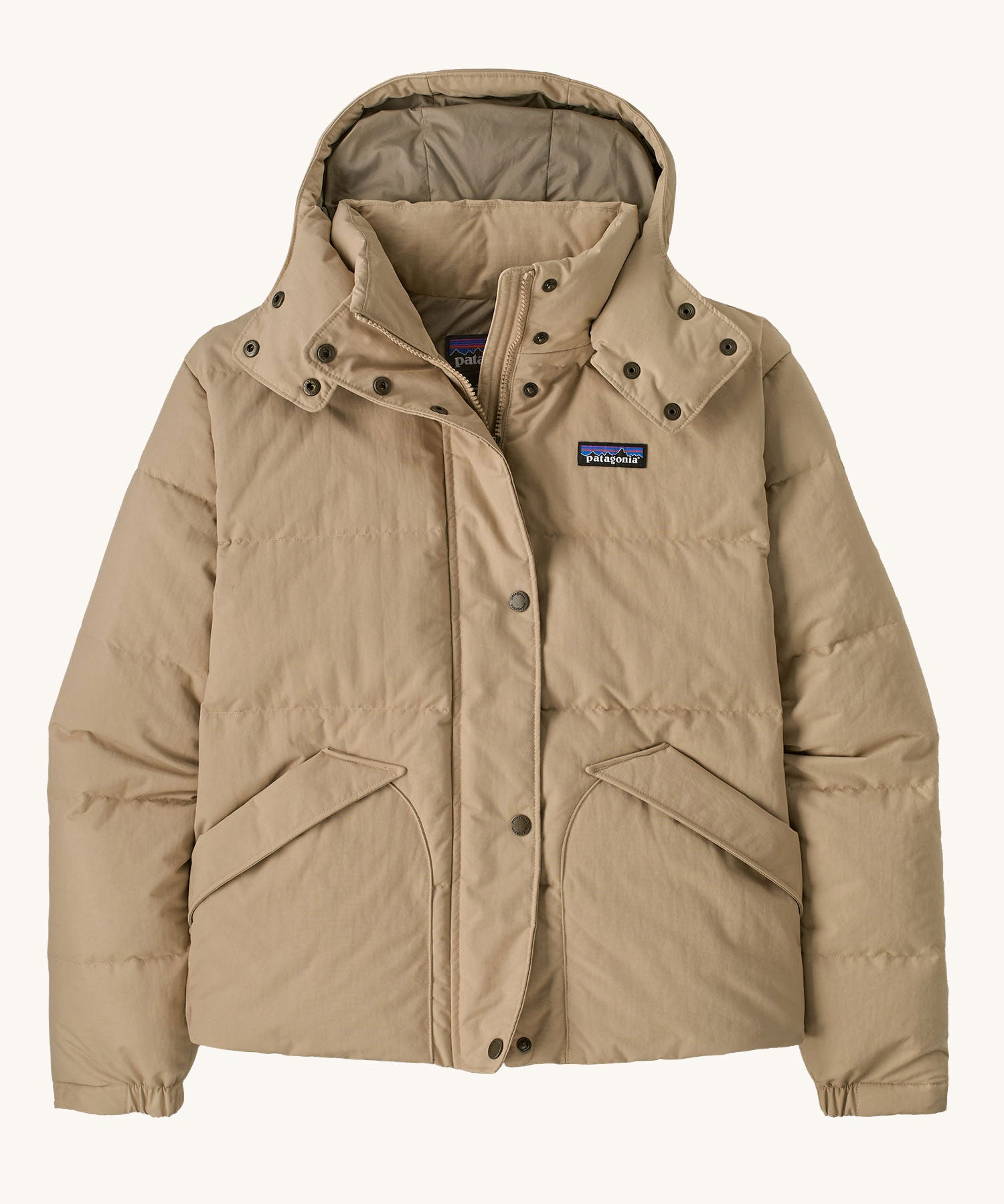 Patagonia Women's Downdrift Jacket Jacket in an Oar Tan Seabird Grey colour. We have a wide range of Patagonia adult's and children's coats and clothing at Babipur.