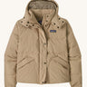 Patagonia Women's Downdrift Jacket Jacket in an Oar Tan Seabird Grey colour. We have a wide range of Patagonia adult's and children's coats and clothing at Babipur.