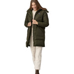 A woman wearing the Patagonia Women's Downdrift Parka in Pine Needle Green. The zip is fully open