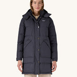 A woman wearing the Patagonia Women's Downdrift Parka Jacket in a Sunken Blue colour.