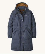 Patagonia Women's Downdrift Parka in Pine Smolder Blue on a plain background