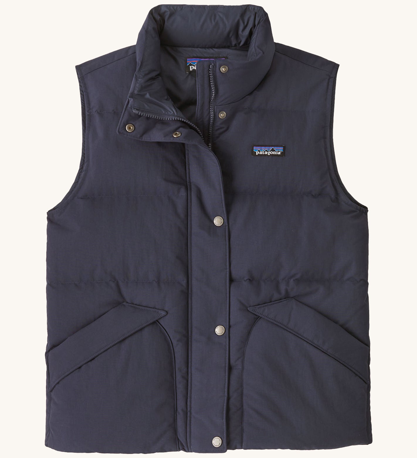 Patagonia womens downdift vest. A blue sleeveles gilet with a full length zip and button fastener. Features 2 side pockets and a logo patch stitched on the left chest.