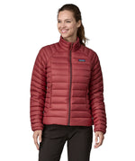 Patagonia women's down sweater jacket in oxide red colour front detail