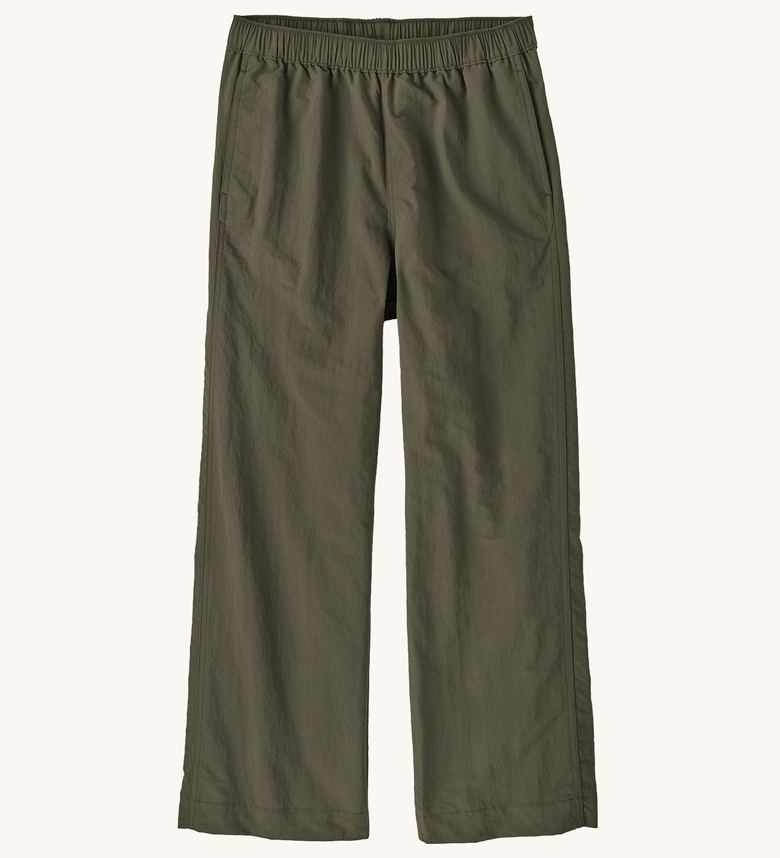 Front view of Patagonia Women’s Outdoor Everyday Pants laid flat on a light background, showing wide-leg cropped trousers in dark khaki green with an elasticated high-rise waistband and simple, clean construction.